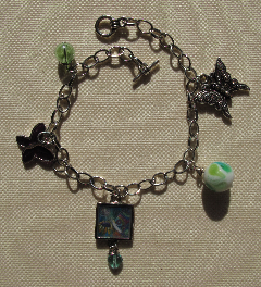 JB0003 - Free at Last Silver Charm Bracelet